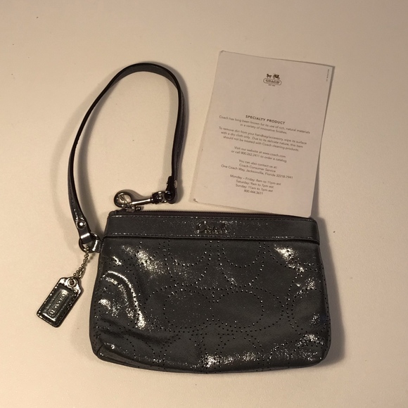 Coach Perforated Logo Silver Wristlet - Picture 1 of 5
